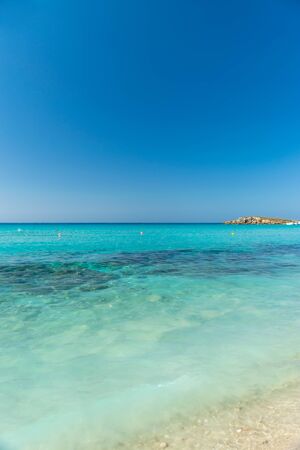 The most famous beach of Cyprus with crystal clear water. Nissi Beach.の写真素材