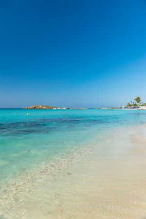 The most famous beach of Cyprus with crystal clear water. Nissi Beach.の写真素材