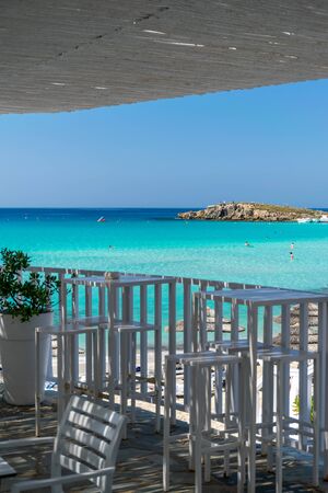 Picturesque terrace on the coast of the azure sea.の写真素材