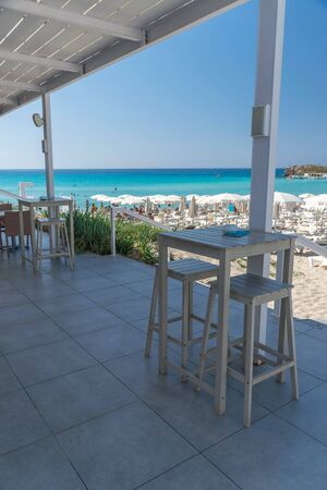 Picturesque terrace on the coast of the azure sea.の写真素材