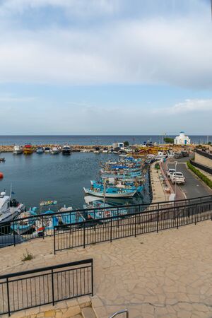 CYPRUS, PROTARAS - MAY 11/2018: Fishermen moored their boats at the pier in the village.のeditorial素材