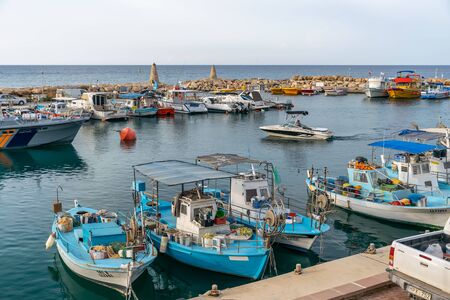 CYPRUS, PROTARAS - MAY 11/2018: Fishermen moored their boats at the pier in the village.のeditorial素材