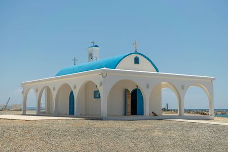 On the seashore is the chapel and cave of Ayia Thekla.の写真素材