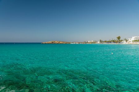 The most famous beach of Cyprus with crystal clear water. Nissi Beach.の写真素材