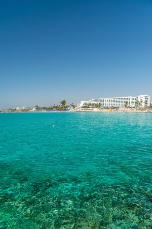 The most famous beach of Cyprus with crystal clear water. Nissi Beach.の写真素材