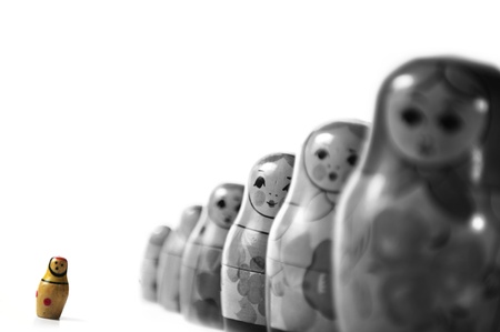 Standing out from a crowd of Babushka in rowの写真素材