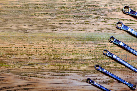 Set of tools on the wood background の写真素材