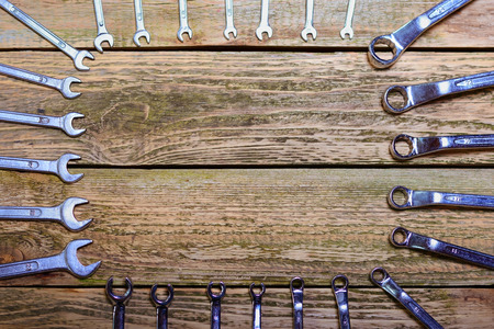 Set of tools on the wood background の写真素材