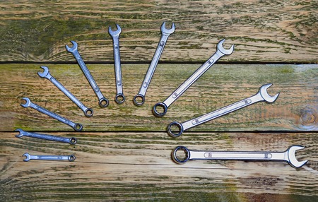 Set of tools on the wood background の写真素材