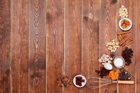 Ingredients cakes on a wooden background. Free space for your text.の写真素材