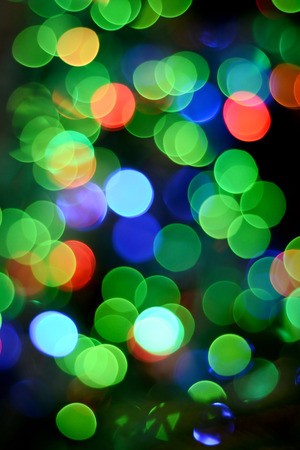 Defocused christmas lights background. Colorful lights background.の写真素材