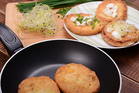 French toasts with goats cheese, fresh chives and sprouts.の写真素材