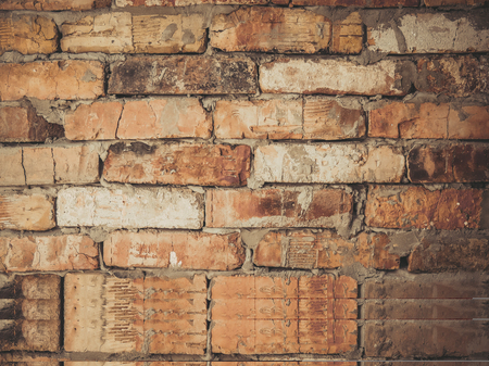 Wall of an old red brick. Vintage background.