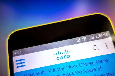 Berdyansk, Ukraine - March 23, 2019: Cisco Systems website homepage. Cisco Systems logo visible on the phone screen, Illustrative Editorial.のeditorial素材