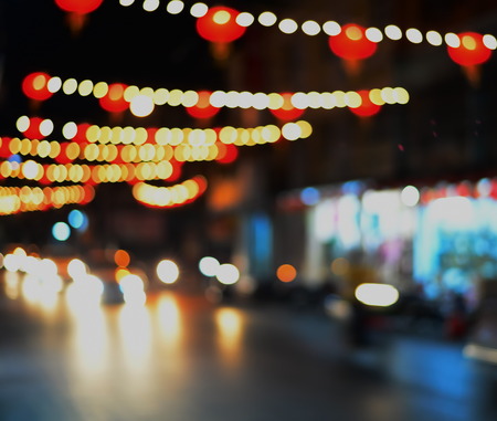 blur yellow and red lamp light at night streetの写真素材