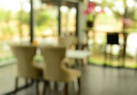 blur couple chairs in cafe backgroundの写真素材