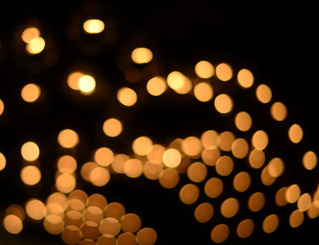 blur gold light bokeh in dark night