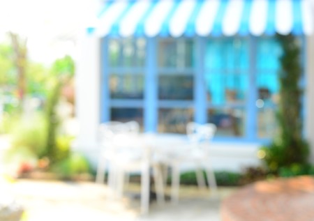 blur chair at cafe white blue color backgroundの写真素材