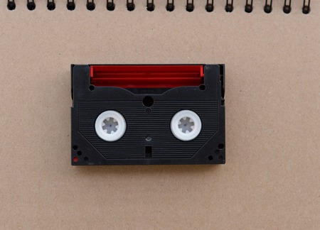 Red black Video tape in retro day brown backgroundの写真素材