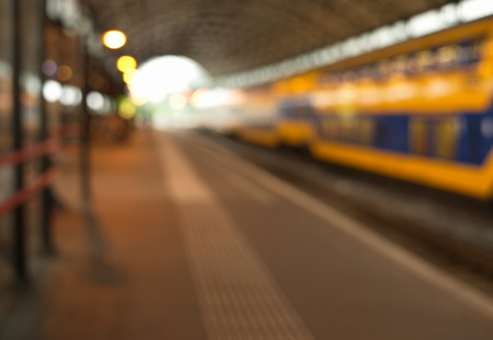 blur light  train on platformの写真素材