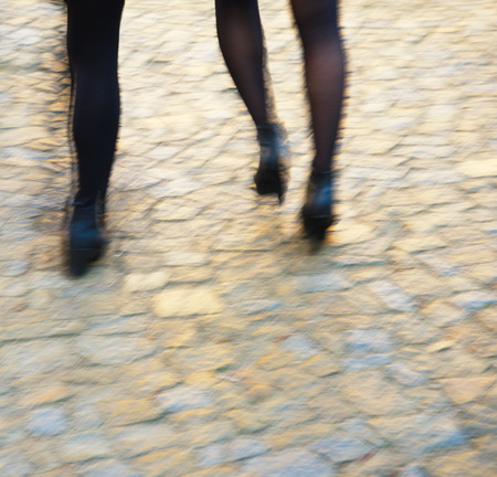 blur young women legs in high heel shoesの写真素材
