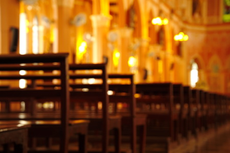 blur wood benchs in church backgroundの写真素材