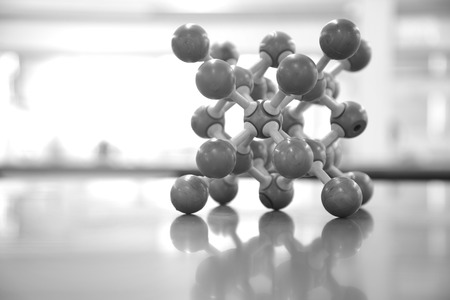 molecular chemical structure model on lab science table background