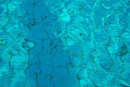 blue water in summer swimming pool abstract background