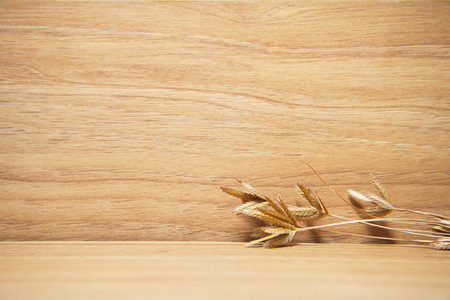 dry grass flower decoration on wood nature backgroundの写真素材