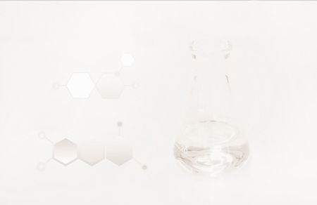 scientific glass flask with drawing chemical structure on white backgroundの写真素材