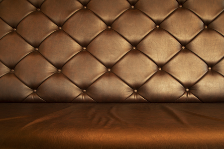 retro dark brown leather sofa or armchair furniture  textured interior backgroundの写真素材