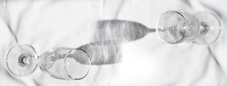 still life couple champagne glass with shadow and light for food and drink fabric white banner...