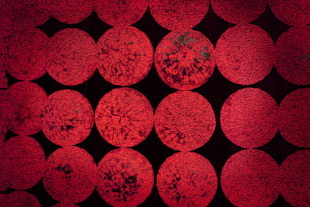 dark red round rough texture abstract on black backgroundの写真素材