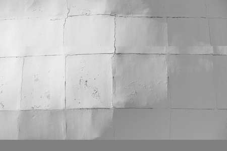 rough texture of cement grey white wall part of architecture backgroundの写真素材