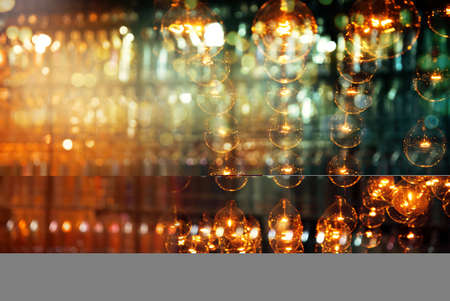 blur round lamp abstract light at sorrow night in bar or pub backgroundの写真素材