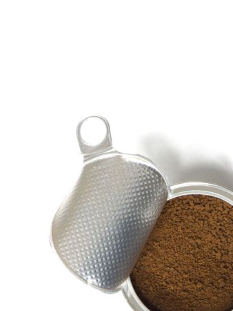 An opened can with coffee  isolated on white background