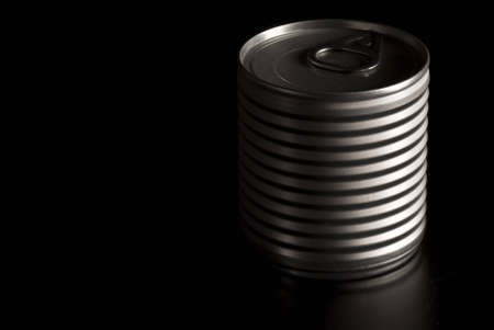 A tin can placed in the dark...の写真素材