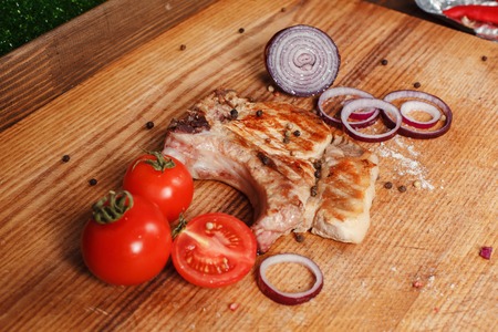 Pork steak with fresh onionsの写真素材