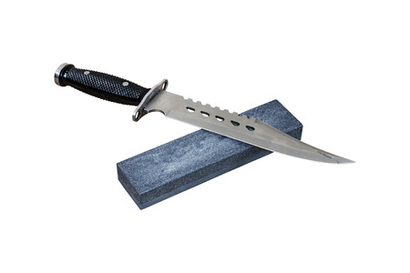 A hunting knife to sharp with carborundum stoneの写真素材