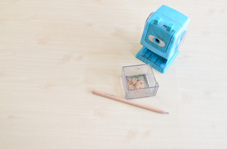 Pencil and the old azure pencil sharpener and sawdustの写真素材