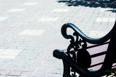 Steel chair in the park on noon of the sunny dayの写真素材