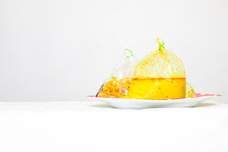 Fired noodle in chicken curry or Kao Soi Kai in thailand language package in plastic bag on the white table.の写真素材