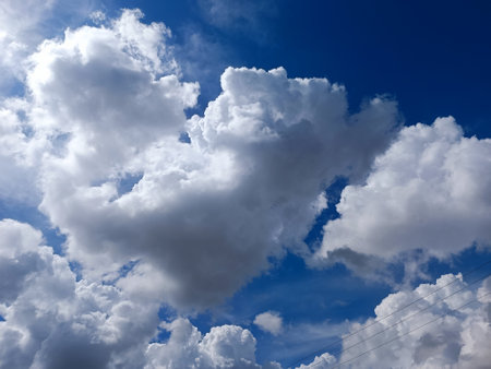 On sunny day with azure sky but sky have many cloud to warn before rain will come to this areaの写真素材