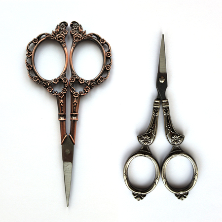 Rustic scissors isolated on white background. Vintage accessory for design. Mockup objects.の写真素材