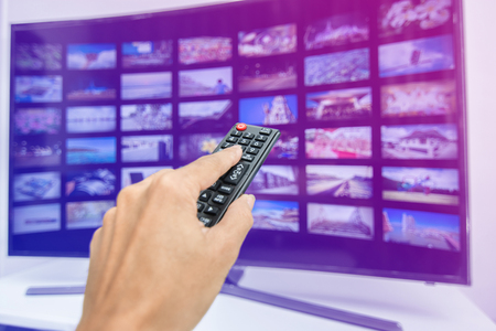 Hand pressing remote of smart tv