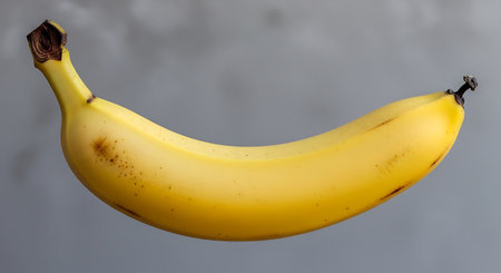 Banana on a gray background. Bunch of bananas on a gray background.の素材