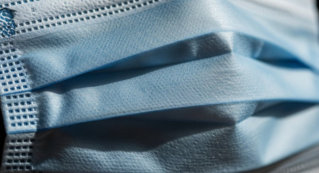 closeup of medical masks for protection against coronavirus covid-19の素材