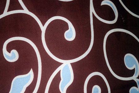 Texture, background, pattern. Silk fabric is brown with a pattern of white lines.の写真素材