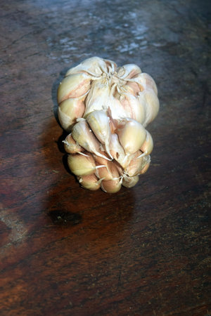 Garlic on a wooden table. Garlic on a wooden table.の写真素材