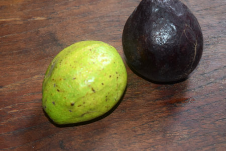 Avocado and lime on a wooden table. Selective focus.の写真素材